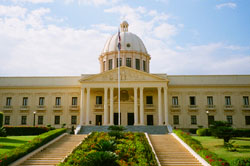 A photo of the Palacio Nacional of the Dominican Republic shown on a bright afternoon on a clear day